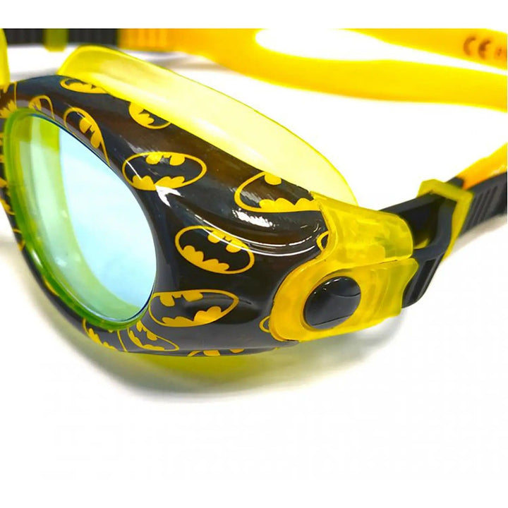 Close up of the side of a pair of Batman logo kids swimming goggles in black and yellow