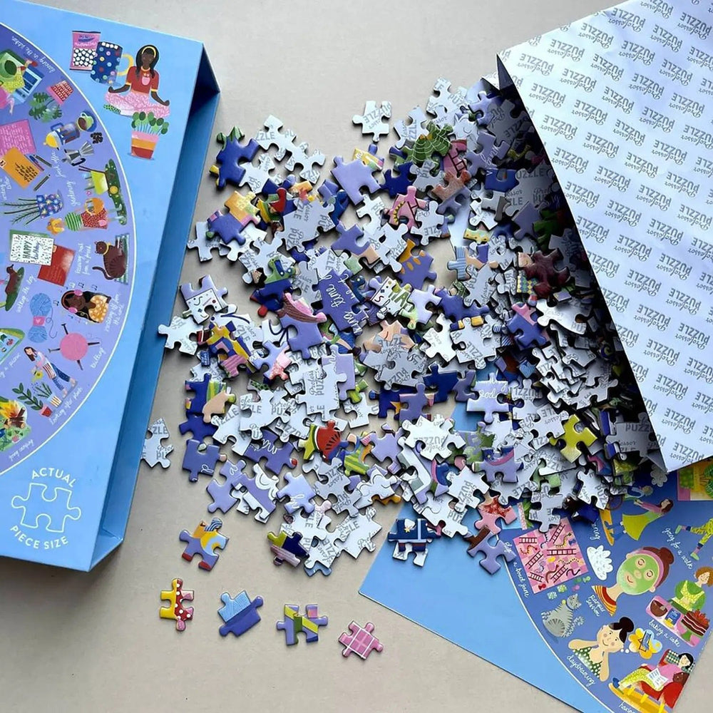 pieces of a circular jigsaw puzzle with poster