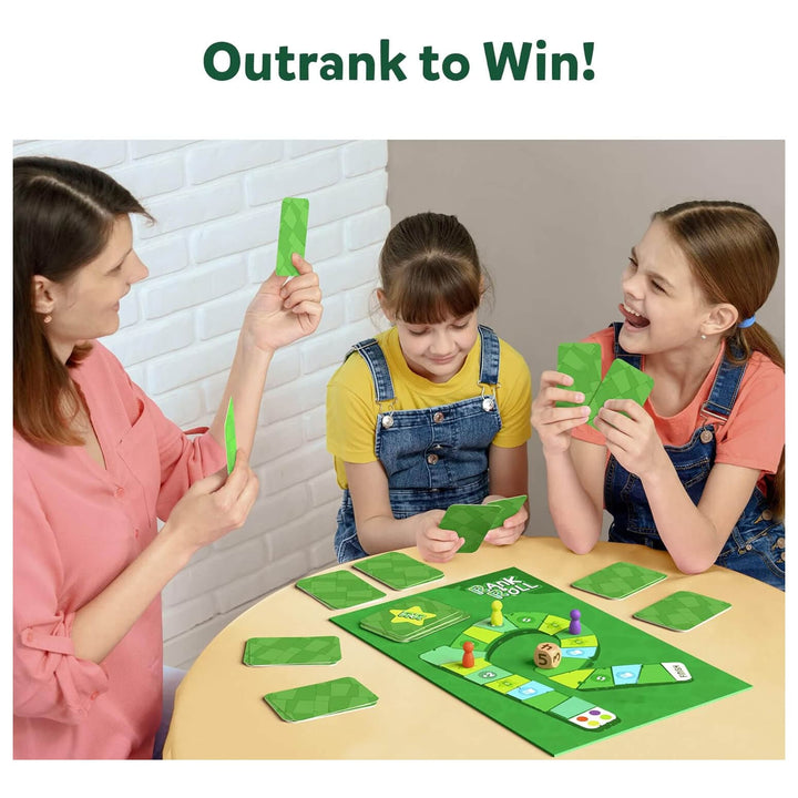 Adult and 2 children playing Rank &amp; Roll board game