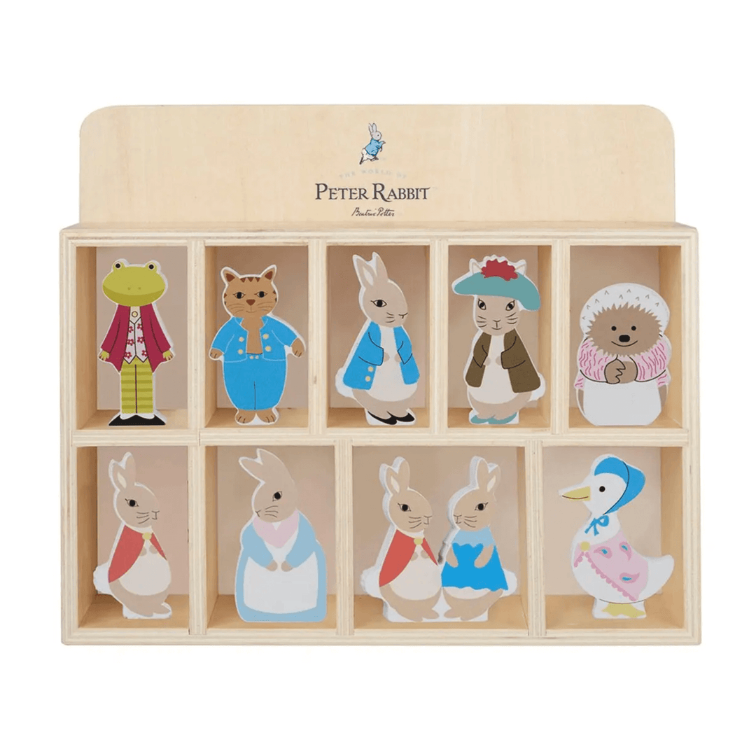 peter rabbit and friends wooden character figure inside display shelf on white background