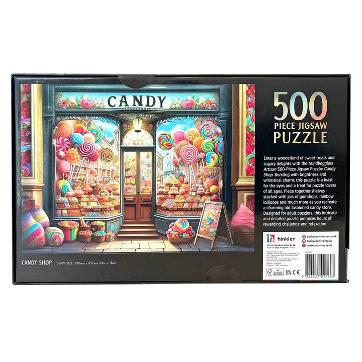 Back of a 500-piece jigsaw puzzle box featuring a colorful candy shop illustration with large windows filled with lollipops, candies, and sweets. 