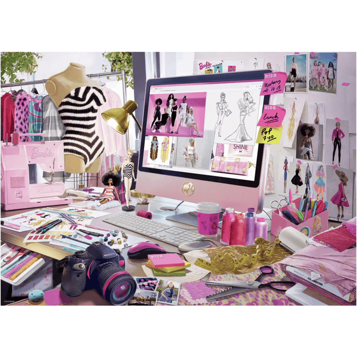 image of completed barbie puzzle featuring fashion designers desk with sewing machine, camera and barbie branded computer