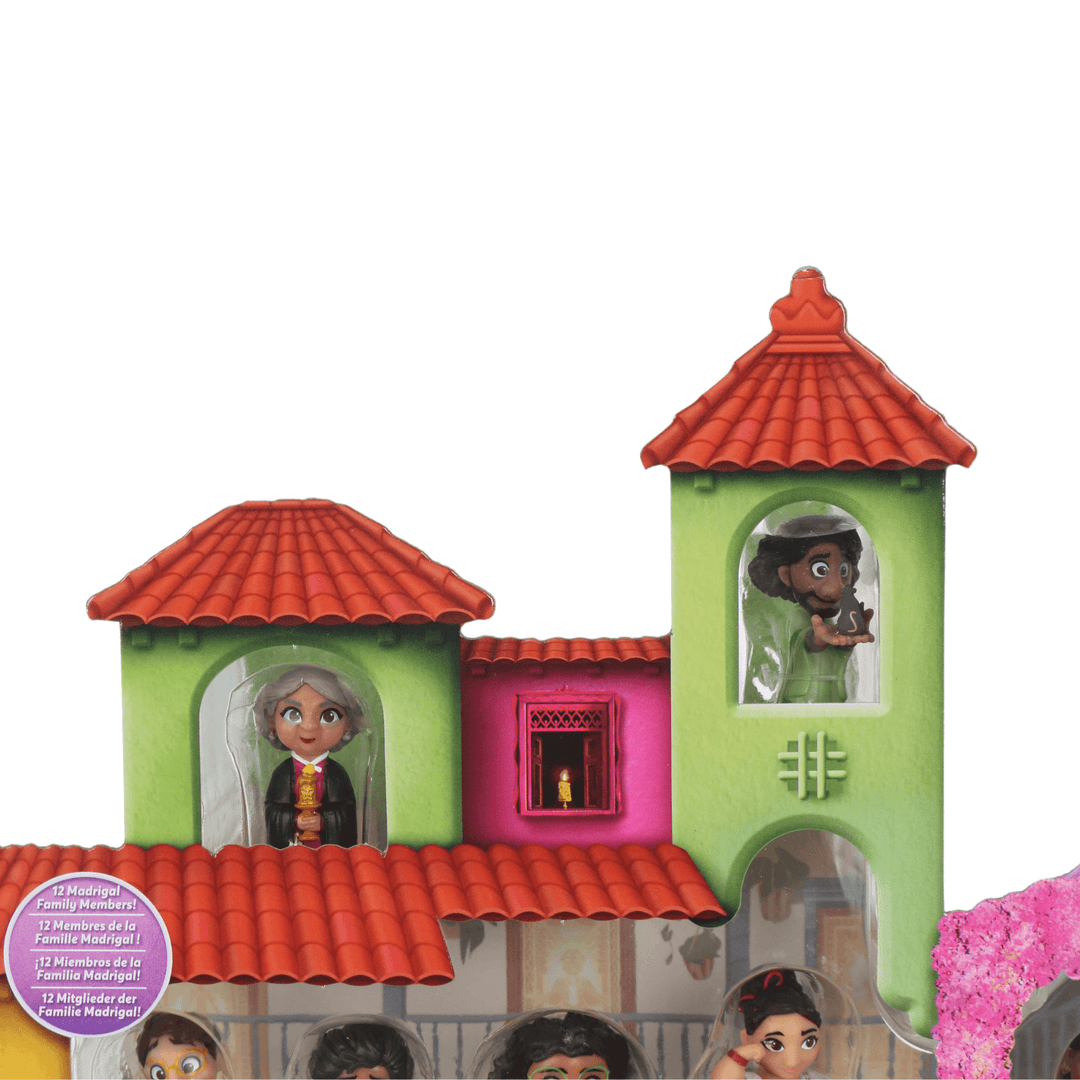 top view of encanto figurine playset featuring green and brown house tower with mini characters inside