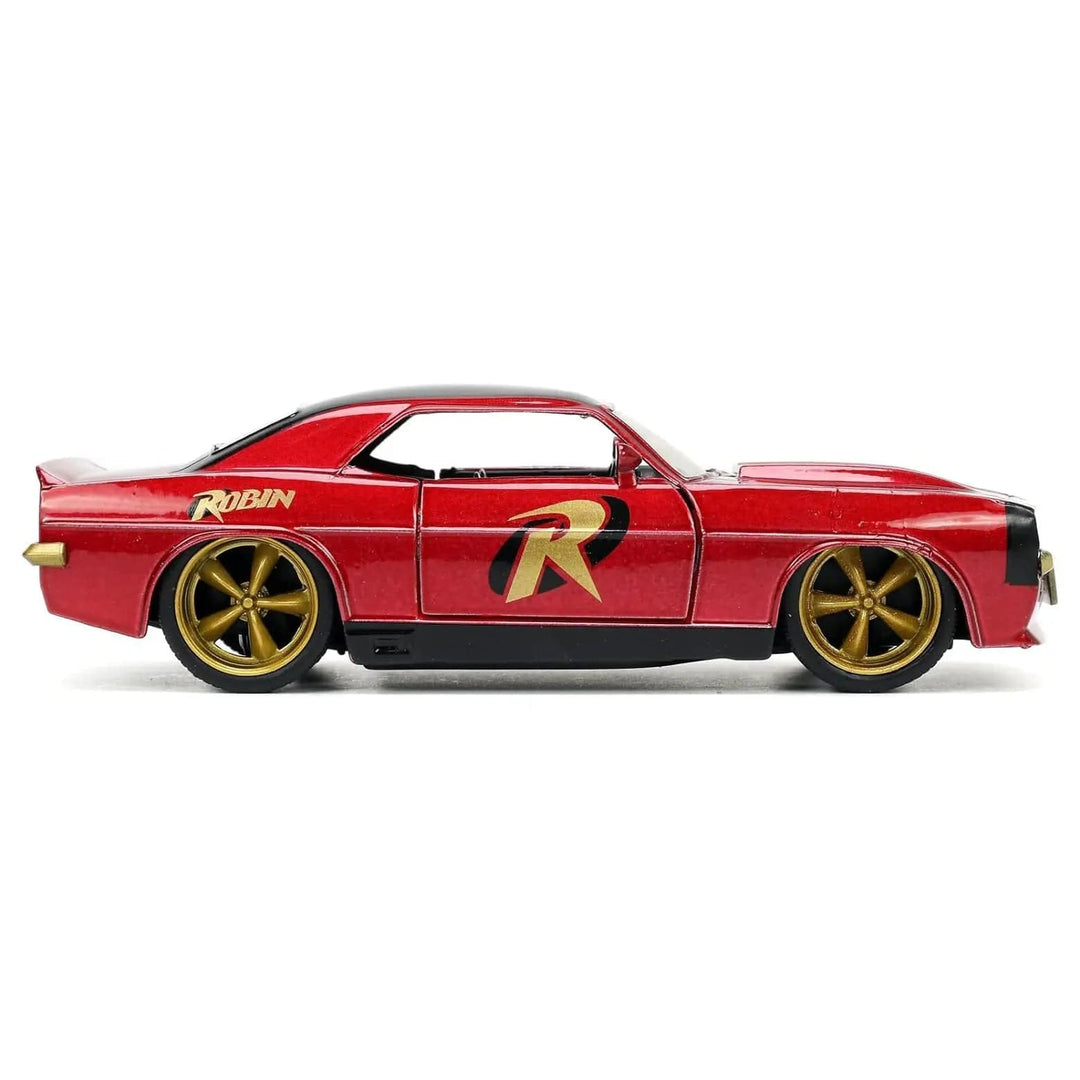 Side view of a die-cast metal model 1969 Chevrolet Camaro in gold and red from the Robin movie