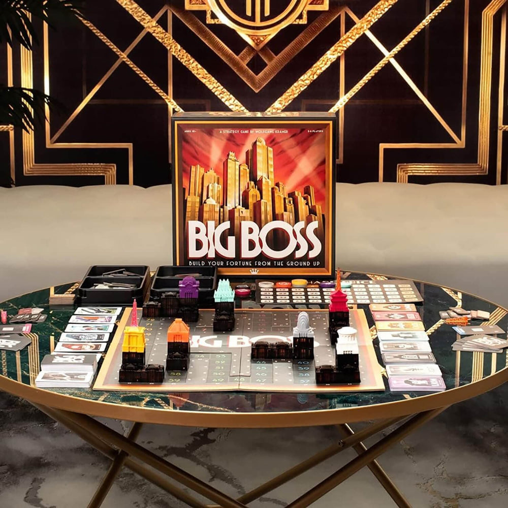 Board game titled 'Big Boss' on a decorative table with a luxurious background.