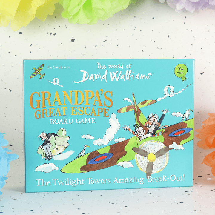 grandpa's great escape board game on white and blue background with colourful fun decor in the background