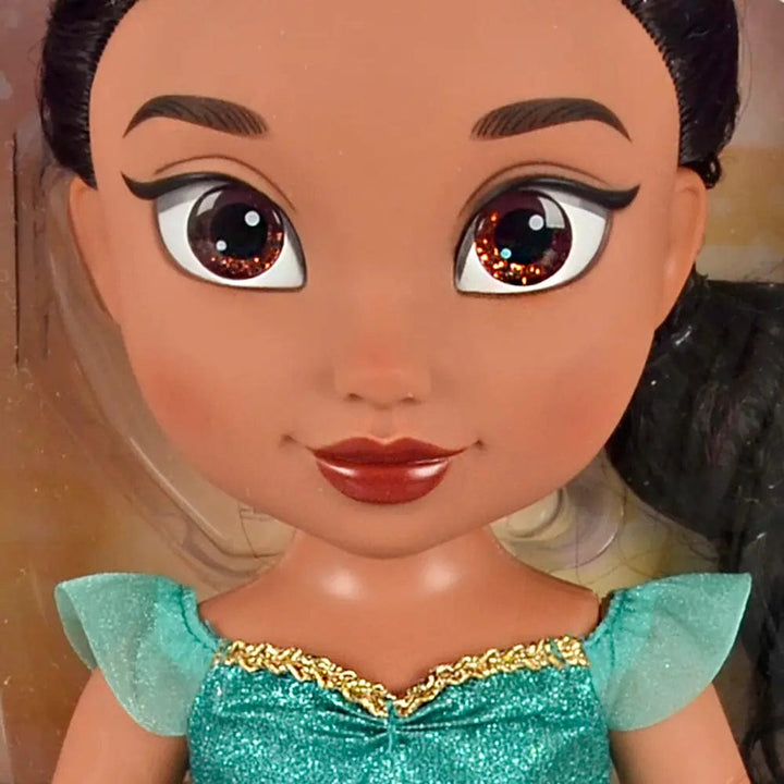 Close up of glittering brown eyes of Princess Jasmine doll