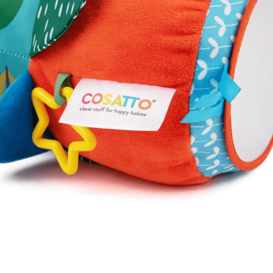 cosatto branding label on tummy time roller with tag line 'clever stuff for happy babies'.