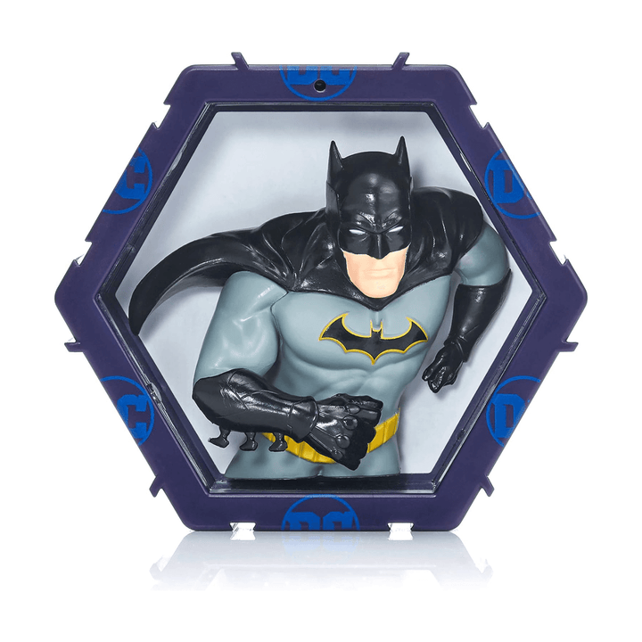 hexagonal batman figure with DC comic print on edge