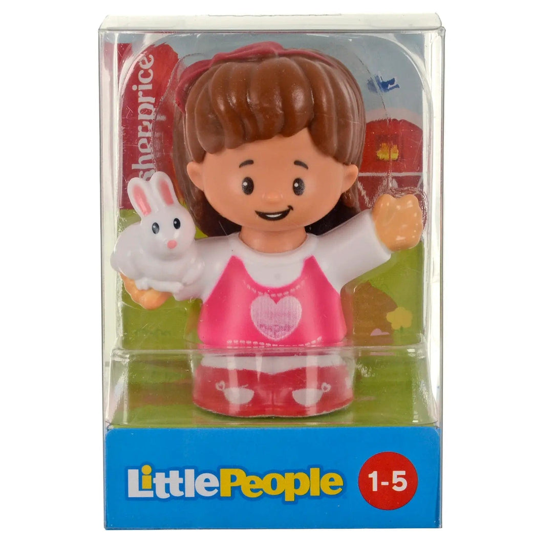 Little People figure with pink top, holding a white rabbit