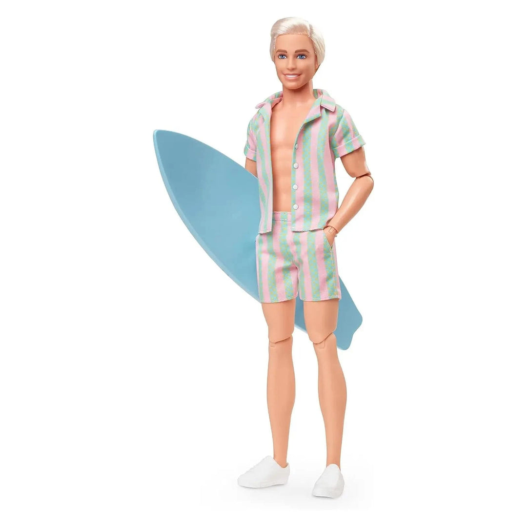 Barbie the Movie Ken doll standing with surfboard