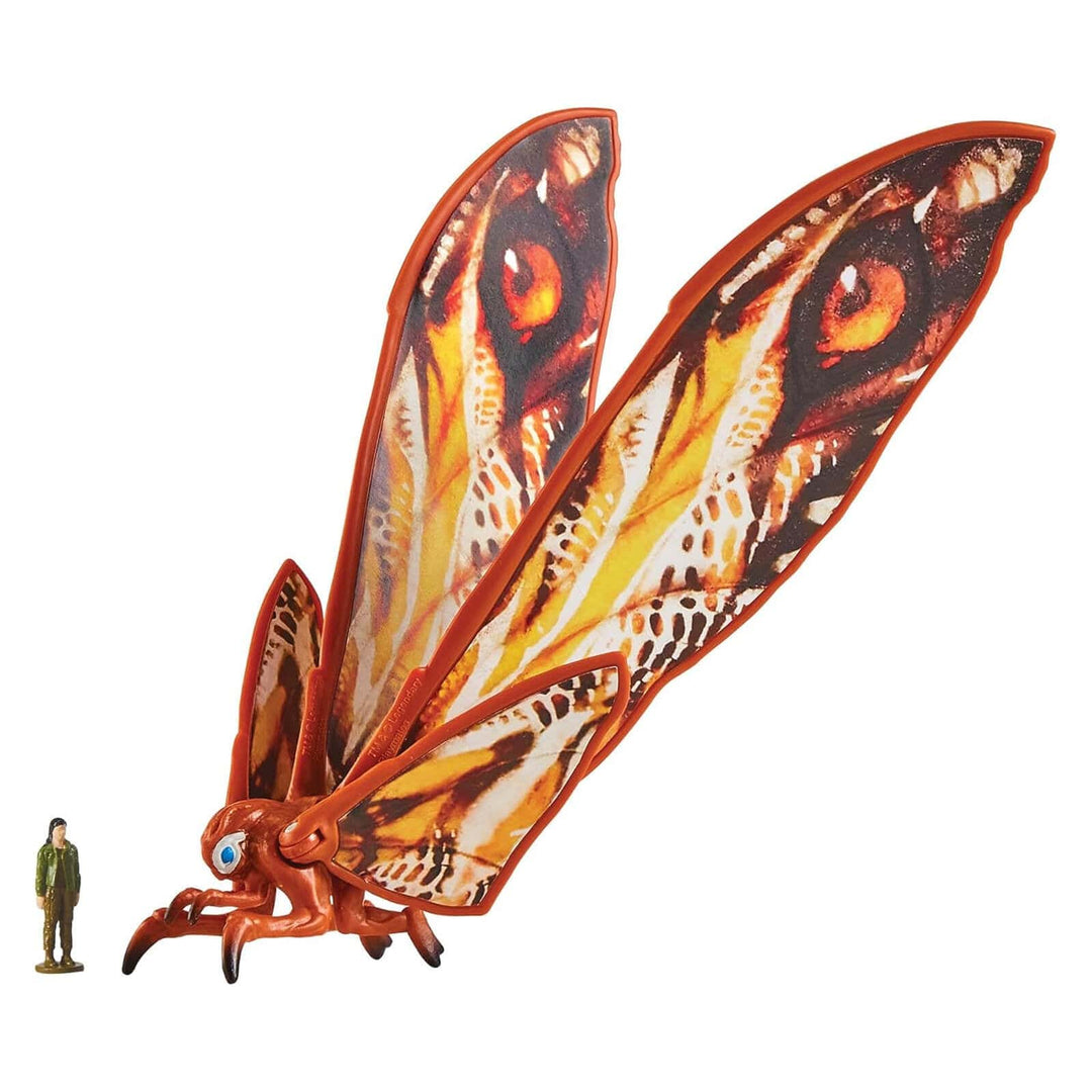 Toy model of a large insect with detailed wings and body, next to a small figure for scale.