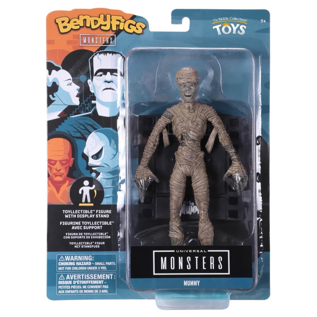 Universal Monsters Mummy toy figure in its original BenyFigs Workster blister card packaging, featuring a detailed mummy action figure with clawed hands and a stand.