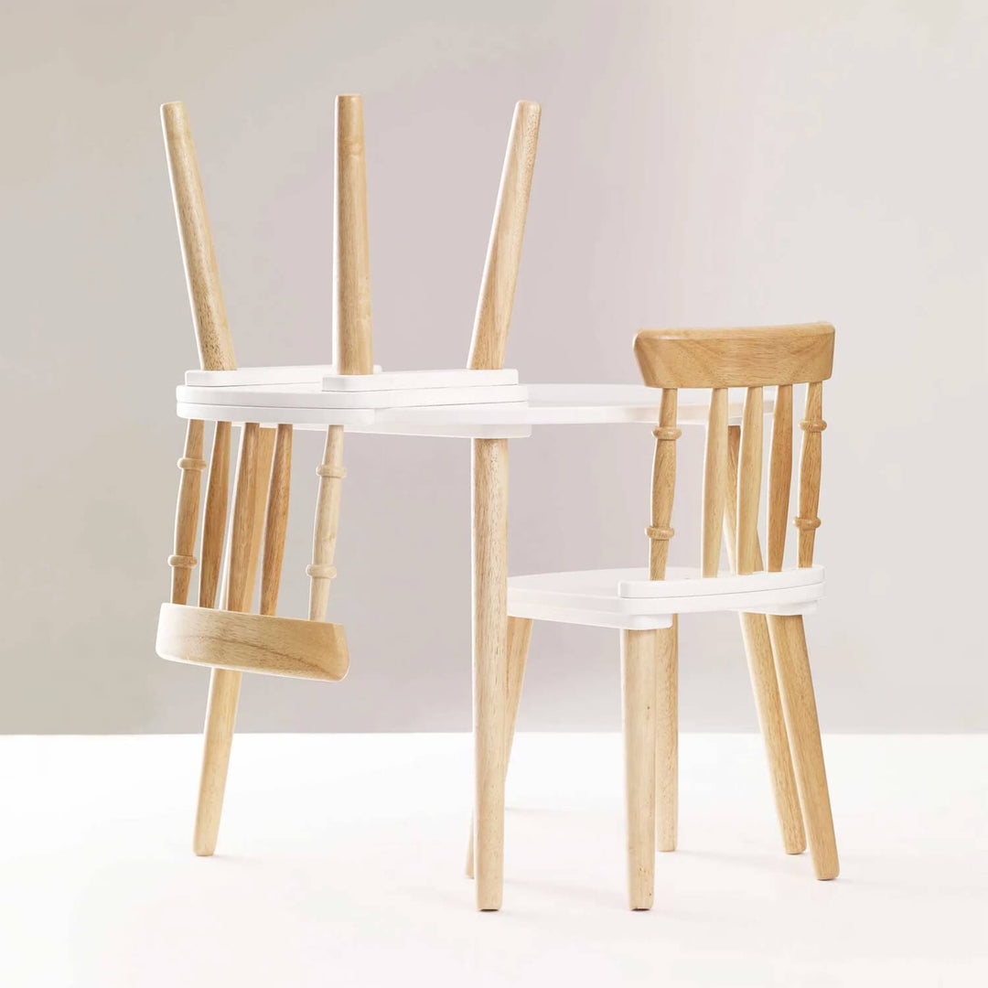Child's wooden table and 2 chairs set with one chair stored on the table top