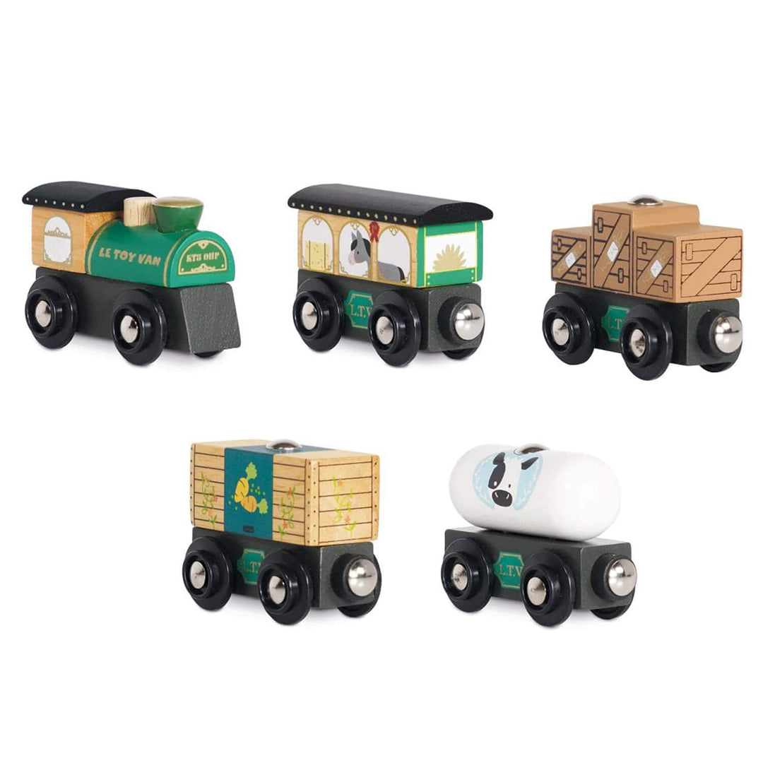 Set of 5 wooden toy train engine and carriages on a white background