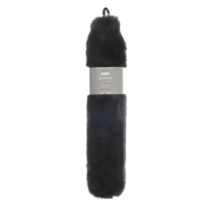 Long hot water bottle with dark grey faux fur cover and hanging loop