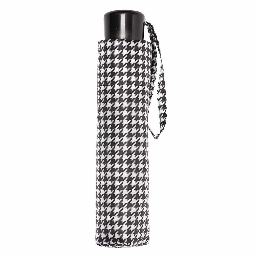 Mini umbrella with black and white dogtooth pattern matching storage sleeve