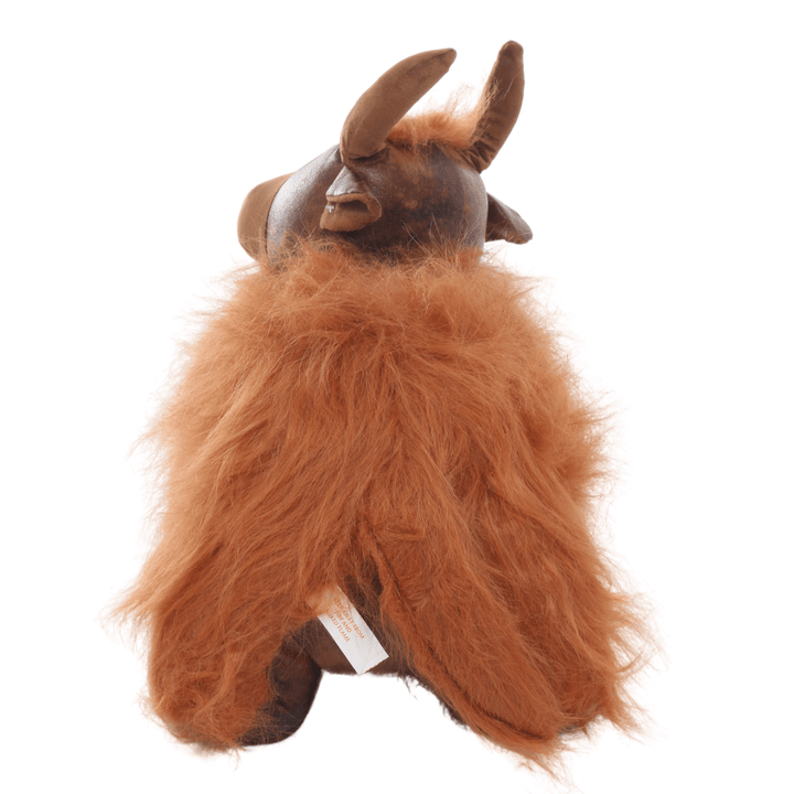 back view of highland cow door stopper with brown tail