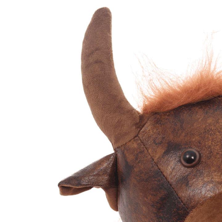 detail shot of soft plush brown horns with faux leather ears