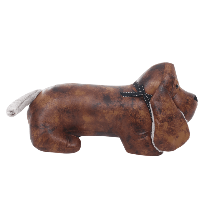 long length sausage dog body with plush tail and black and white bow detail