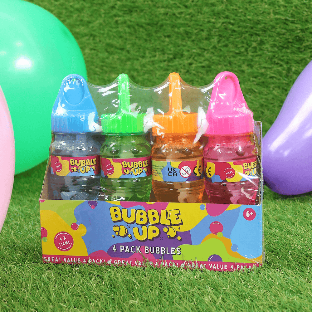 pack of 4 bubbles on grass with coloured balloons in the background