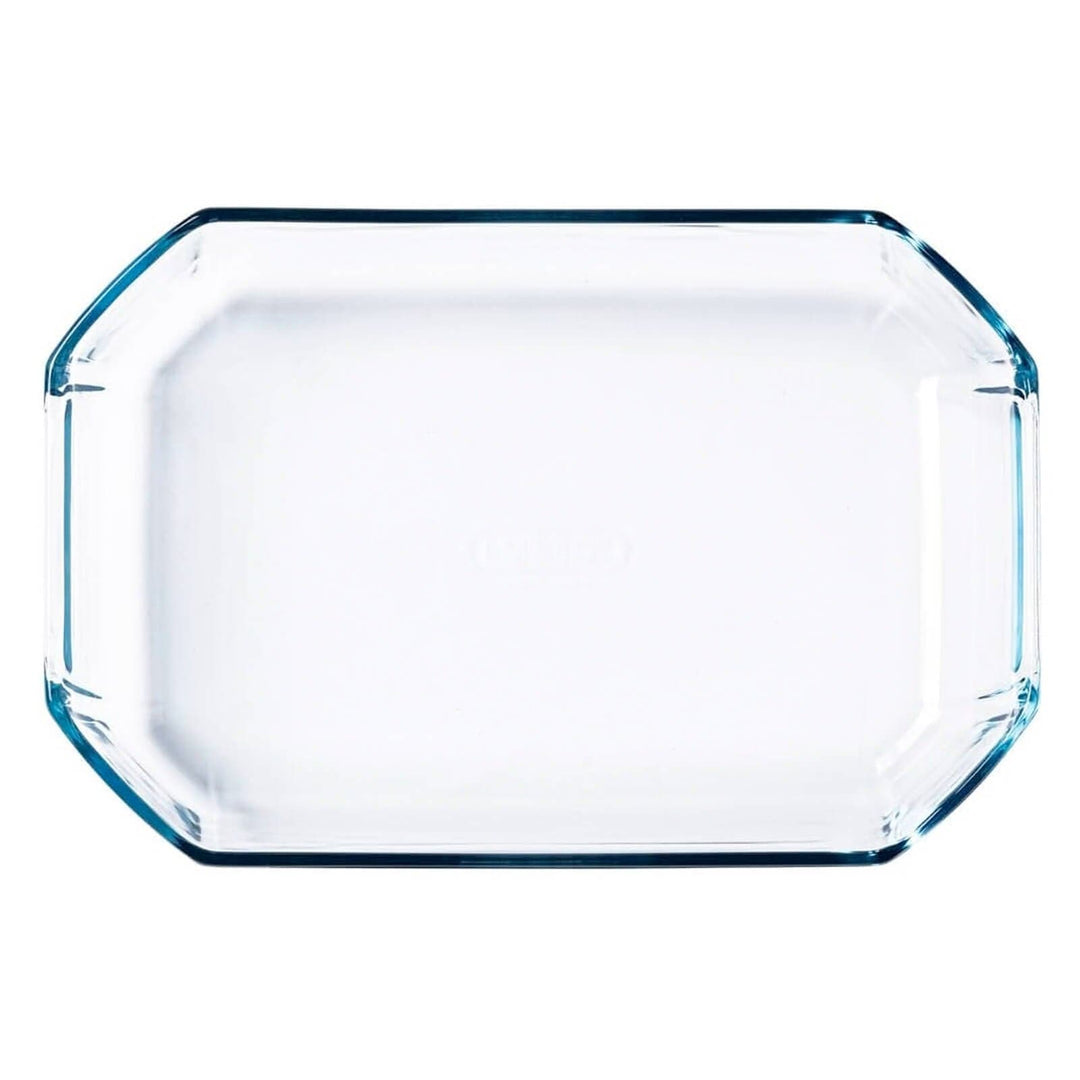 Overhead view of a glass rectangular oven dish on a white background