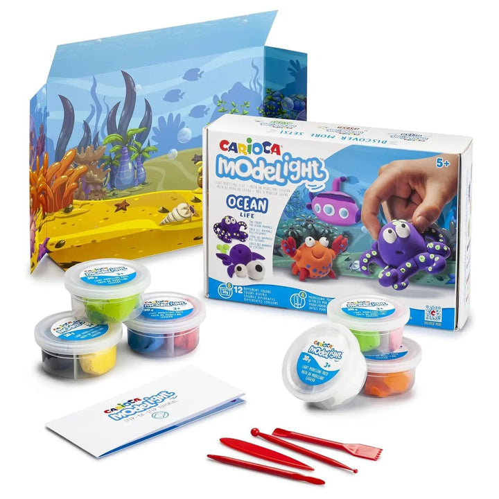 Box contents of Modelight Ocean Life play dough set with 6 tubs of clay, 4 modelling tools, scenic backdrop and instructions