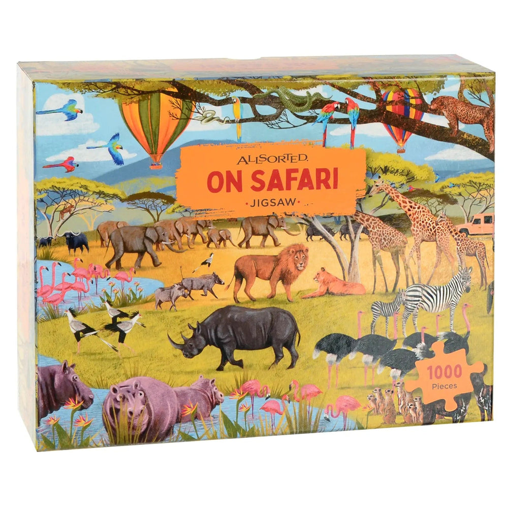 On Safari theme 1000 piece jigsaw puzzle with lions giraffes, rhinos, hippos and lots more animals