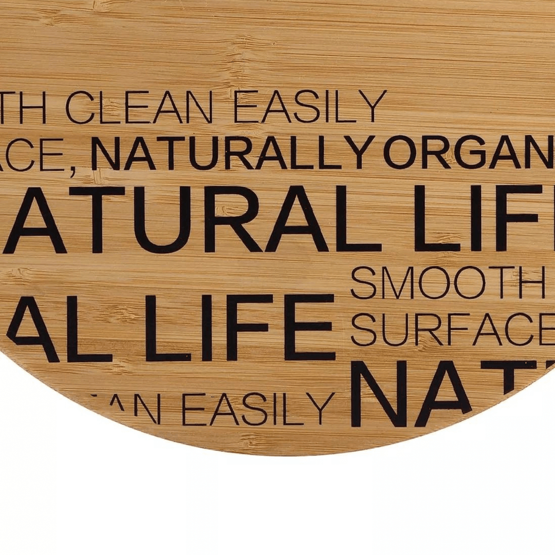 detail shot of black text on bamboo cutting board featuring words 'natural' 'smooth surface'