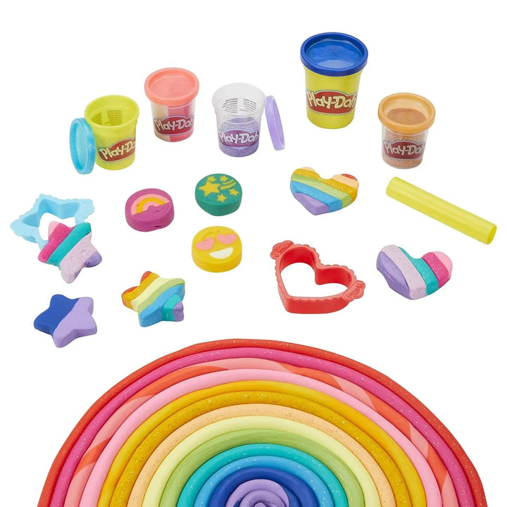 Stars and hearts shaped creations with tubs of Play-Doh assorted rainbow colours