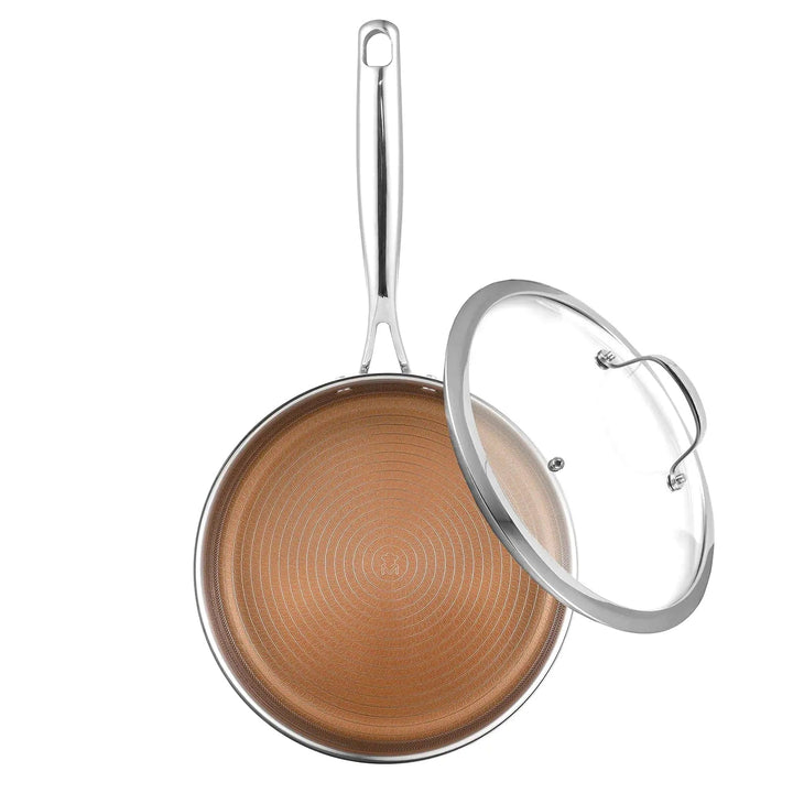 Large saute pan with gold non stick coating and a glass lid