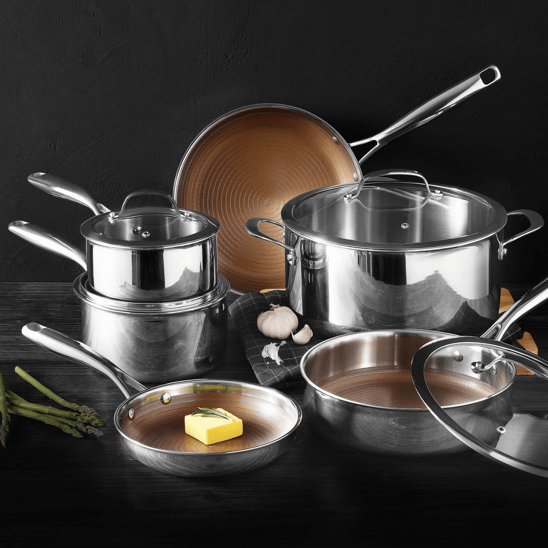 cookware set on black kitchen worktop