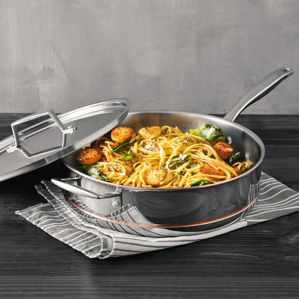 scallop linguine in a polished stainless steel saute frying pan with lid