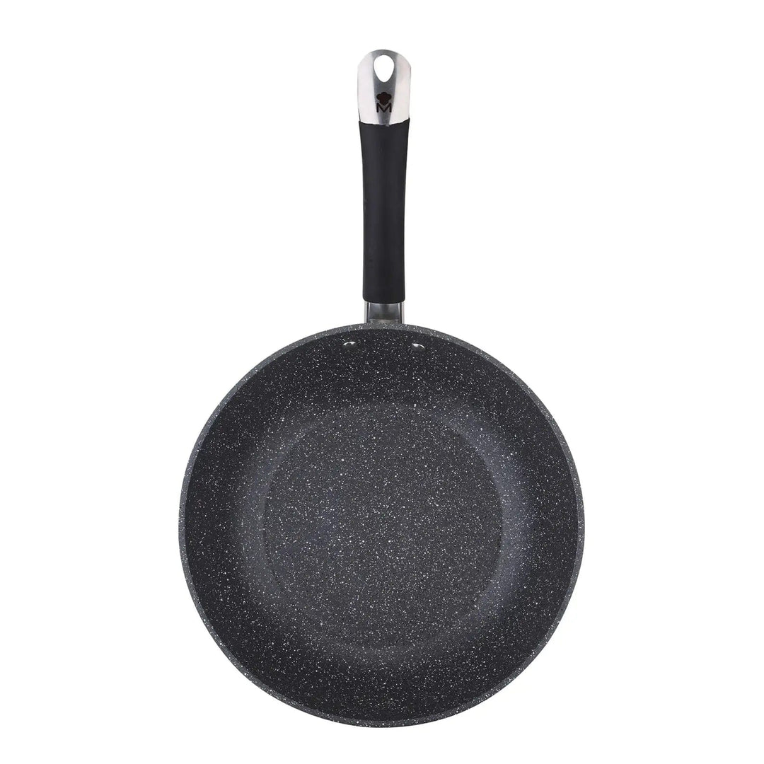 Overhead view of a wok with black granite effect non-stick interior