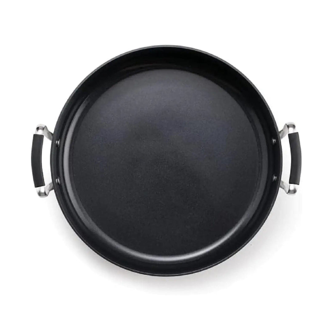 Overhead view of a 2 handled shallow pan with black non-stick interior