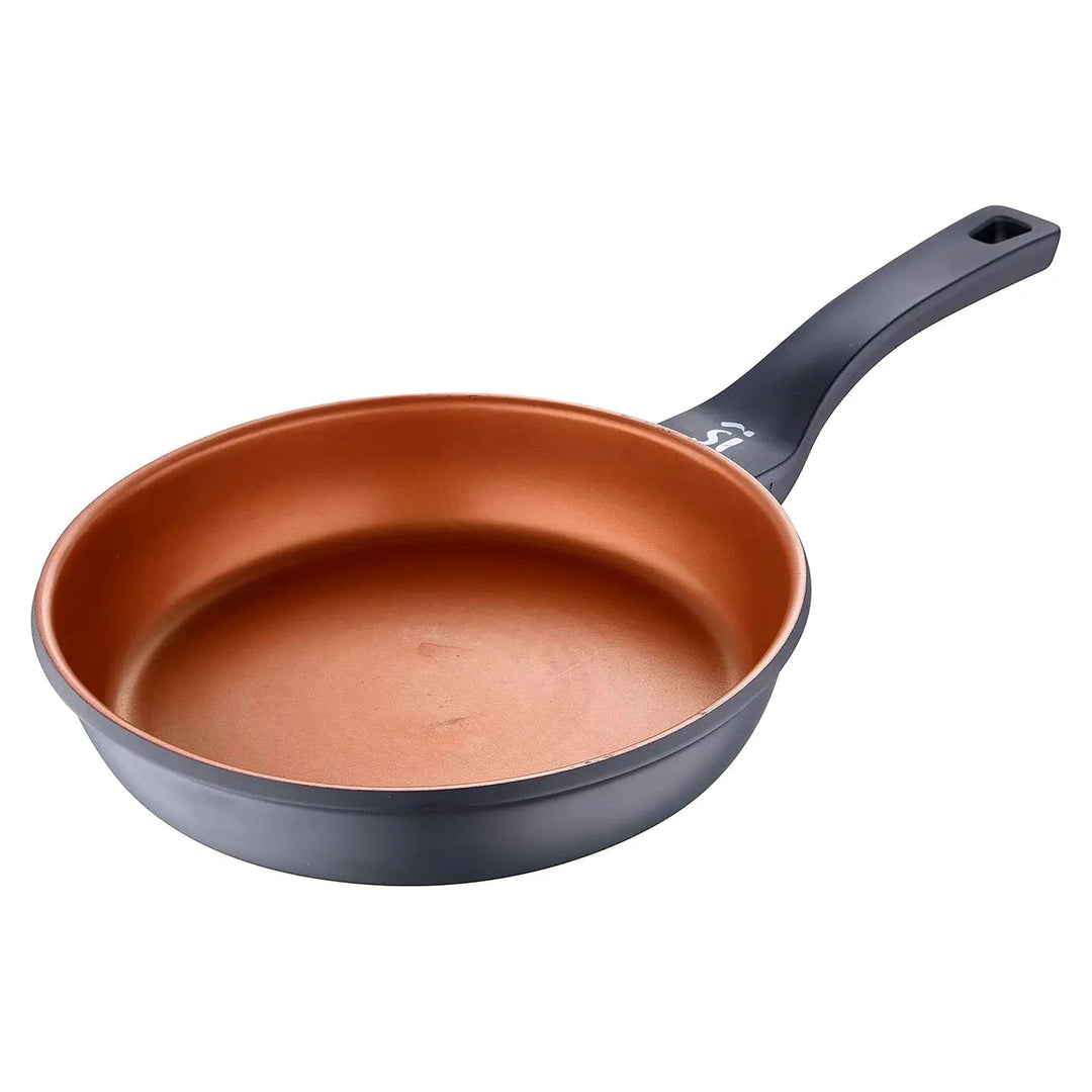 Frying pan with bronze coated interior and matte black handle