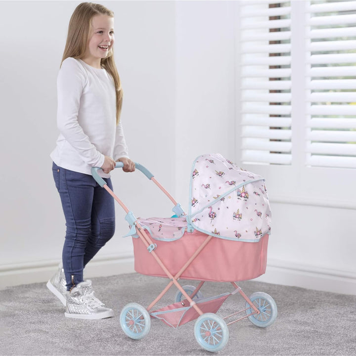 A Young girl Walking with her pink toy pram with light blue handles, showcasing a white canopy adorned with flamingo, flower, and butterfly designs.