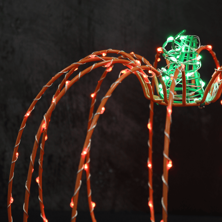 detail shot of copper wire led lights on metal pumpkin shape outline