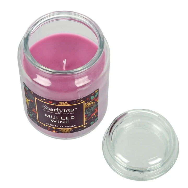 Mulled Wine scented Christmas candle with glass lid off to show a single wick and purple wax