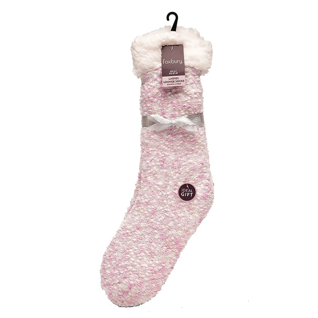 Pair of pink slipper socks in packaging with silver ribbon bow