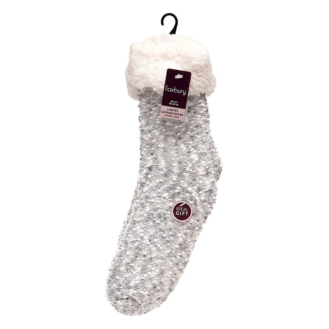 Pair of grey slipper socks in packaging with silver ribbon bow