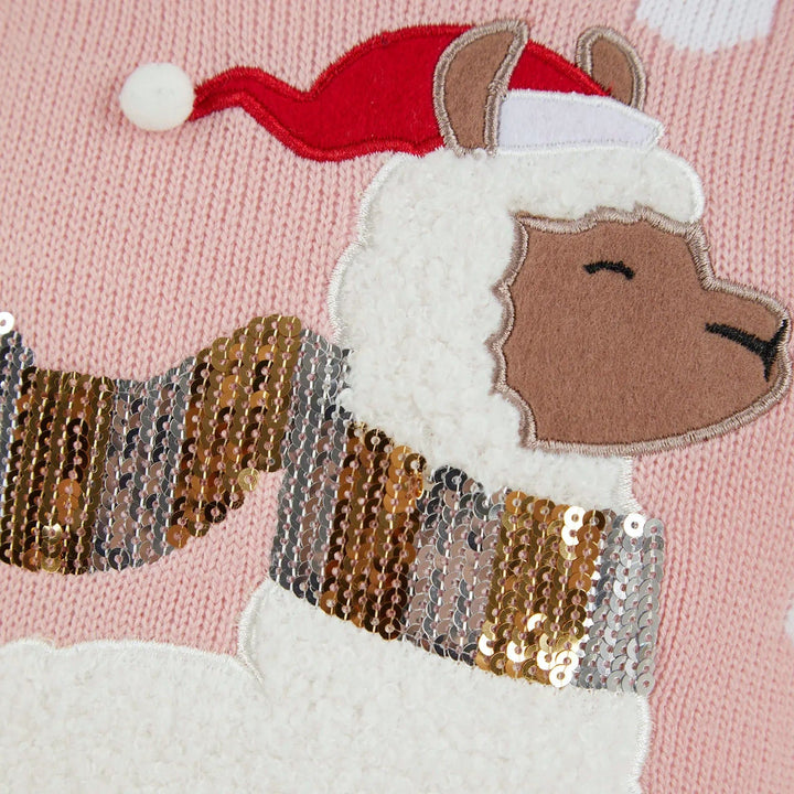 Close up of llama design on a pink Christmas jumper, gold and silver sequins, white fleece and santa hat