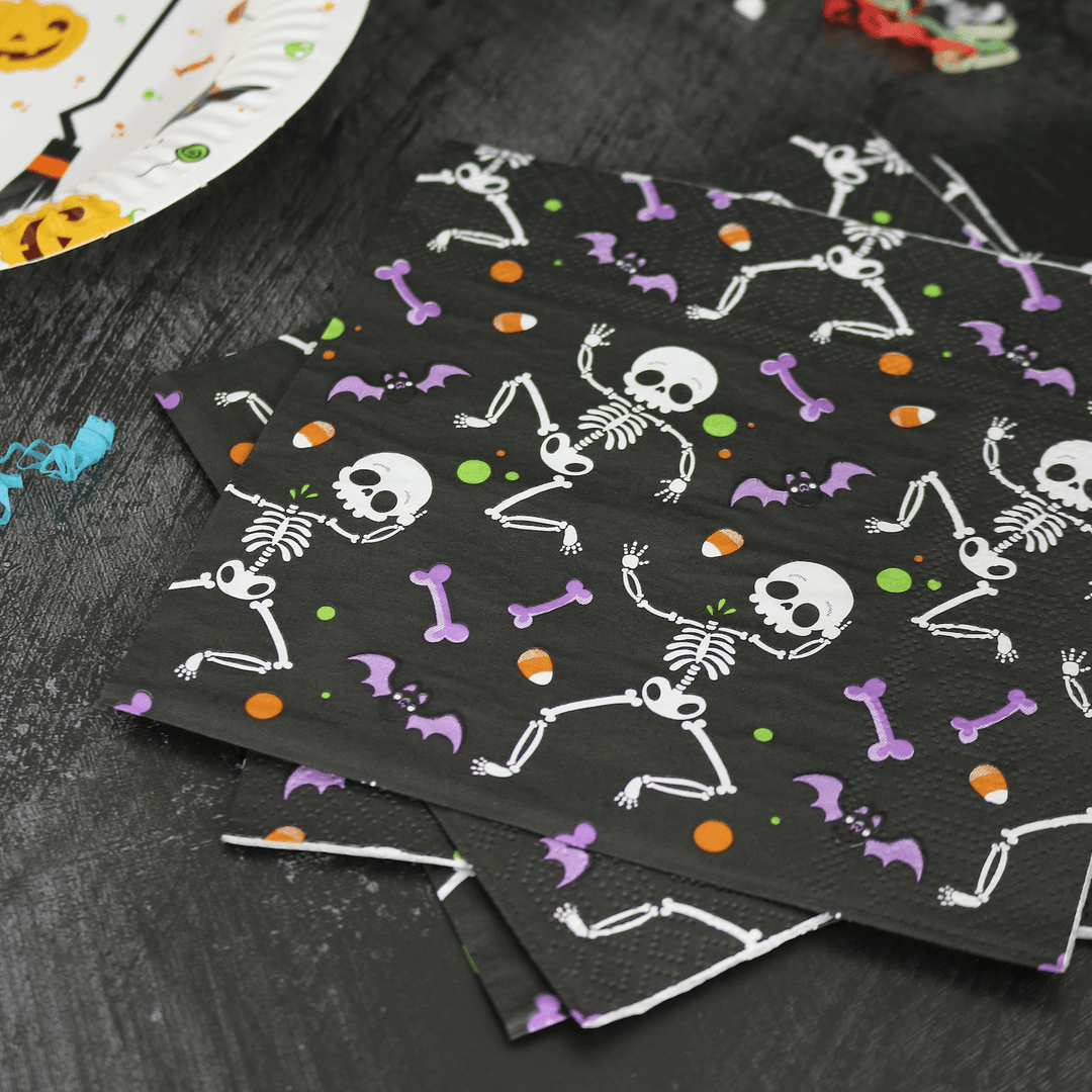 dancing skeleton napkins on black halloween table