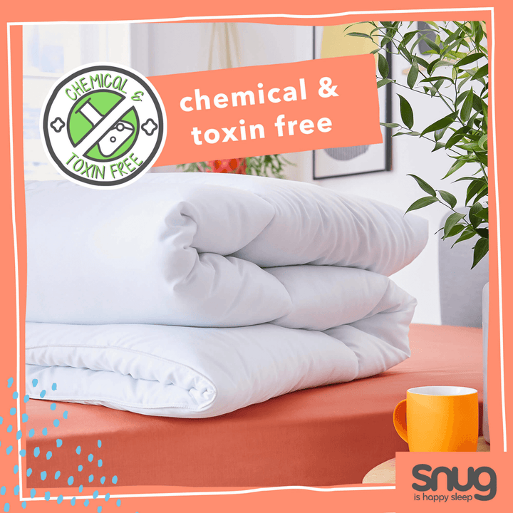 duvet folded on a bed with &