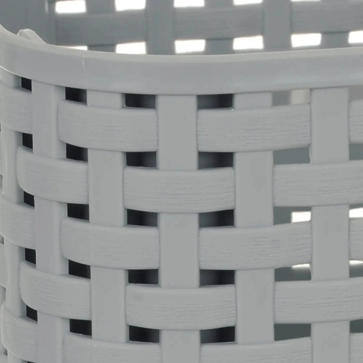 Close up of a woven design plastic grey storage basket for craft supplies