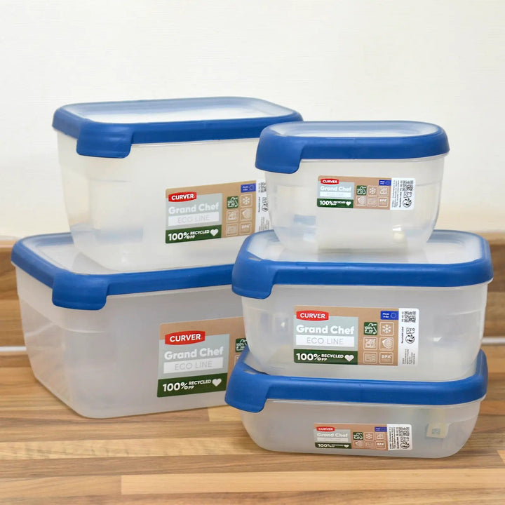 5 rectangle shape food storage boxes with clear container and blue sealing lid, stacked on a kitchen worktopon a kithen worktop