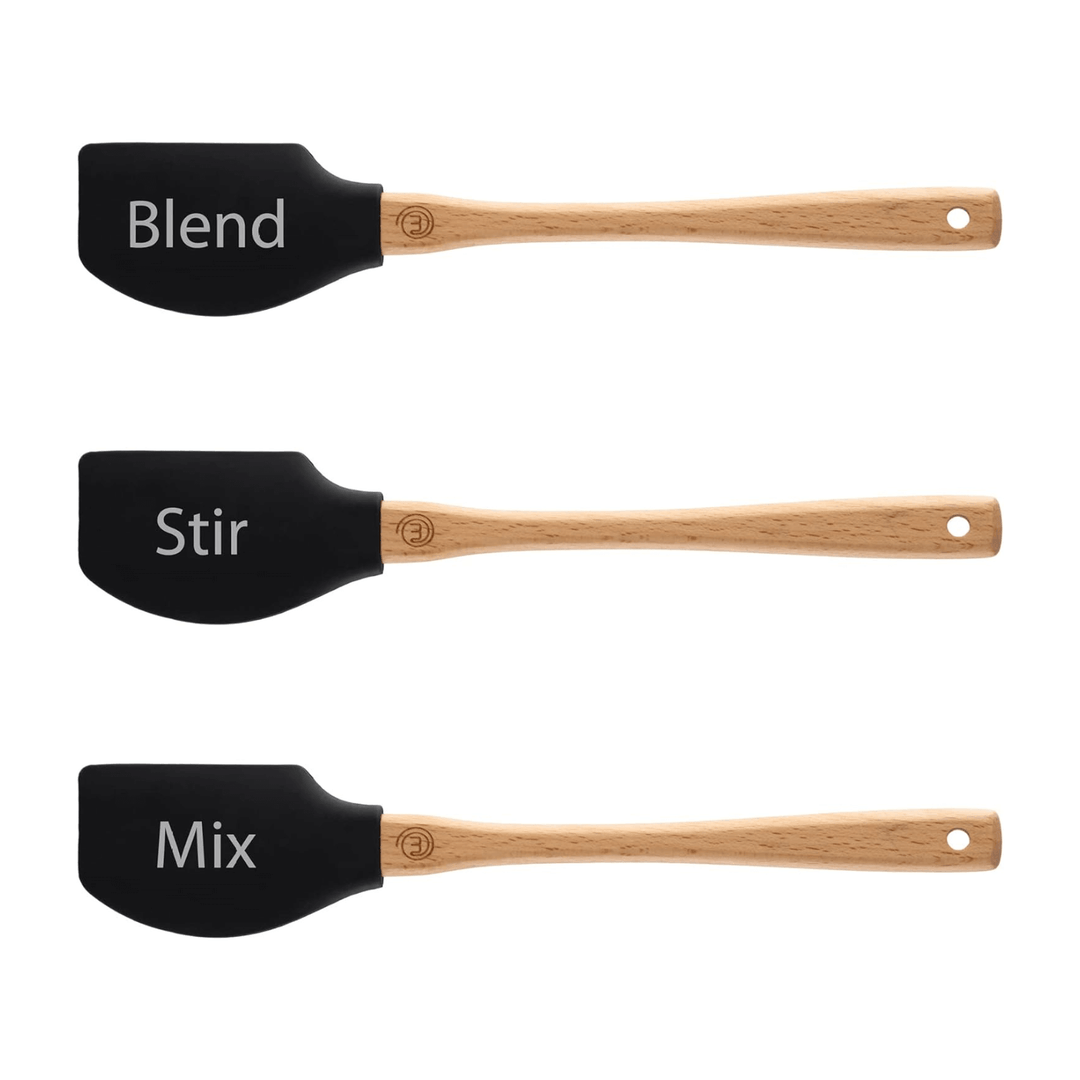 3 spatulas featuring black silicone ends and wooden handle with masterchef logo