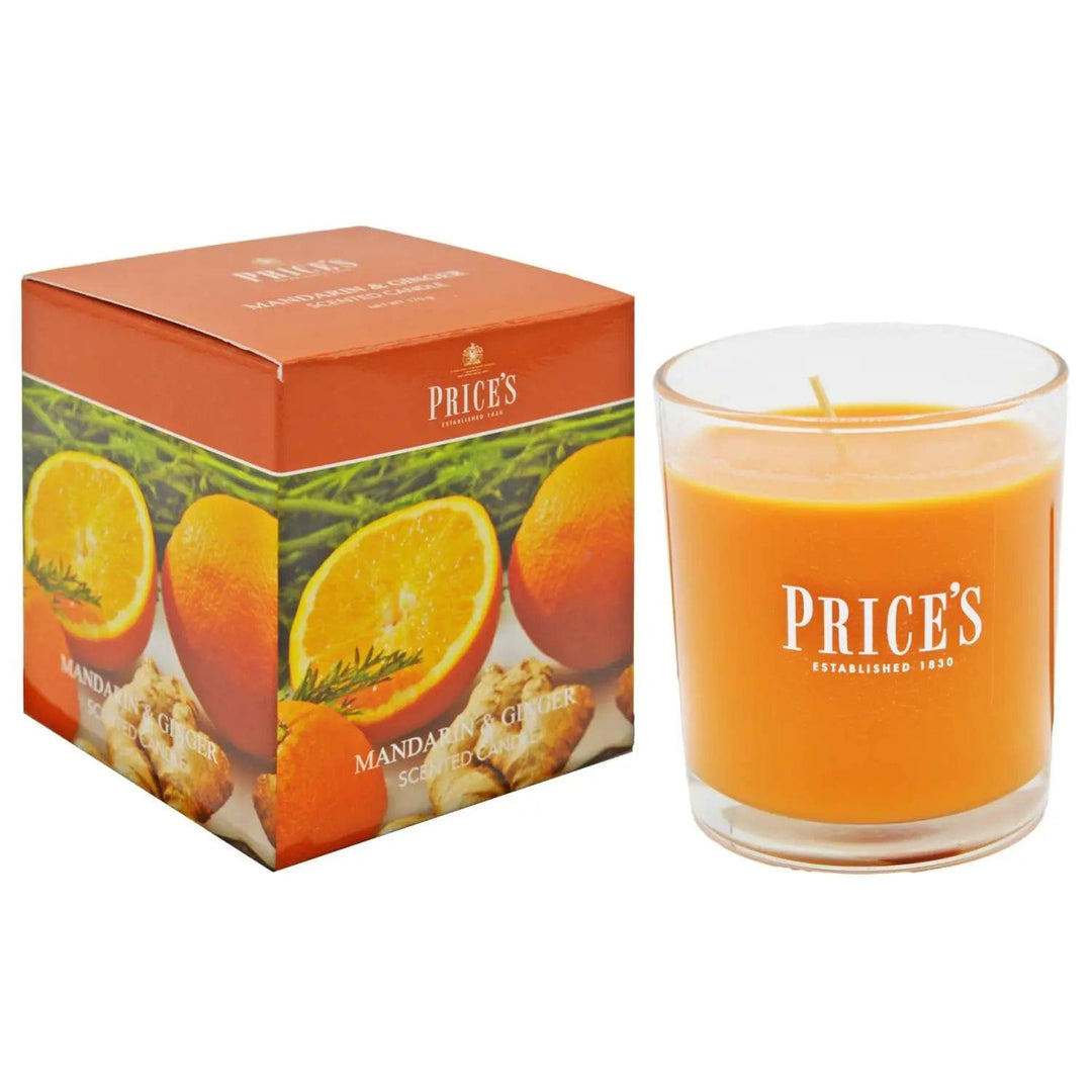 Mandarin and ginger scented candle in glass jar with gift box packaging