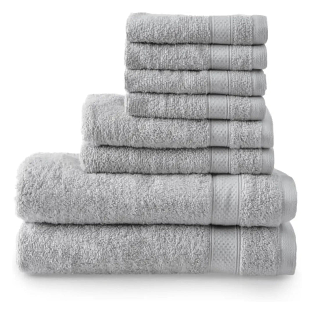 Silver grey towels piled up, with 2 bath towels, 2 hand towels and 4 face cloths