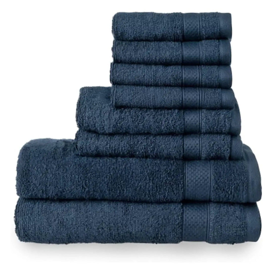 8 dark navy towels piled up, with 2 bath towels, 2 hand towels and 4 face cloths